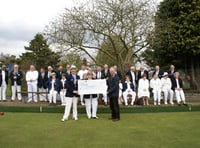 Bowls club hands over £1,572 to dementia charity