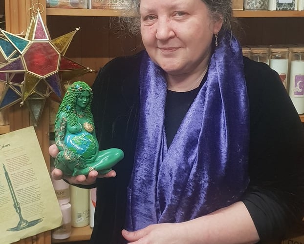 Nurtured by Nature owner Stacy Faulkner with a similar ‘Mother Earth’ figurine

