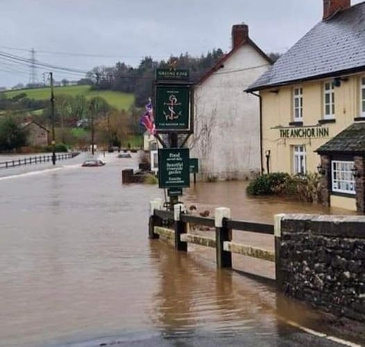 Flooding outside the Anchor Inn at Exebridge