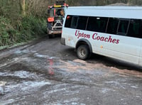 School bus collides with hedge in icy conditions 