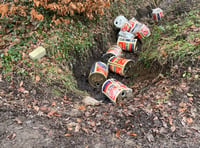 Fly-tippers caught on camera dumping empty cans