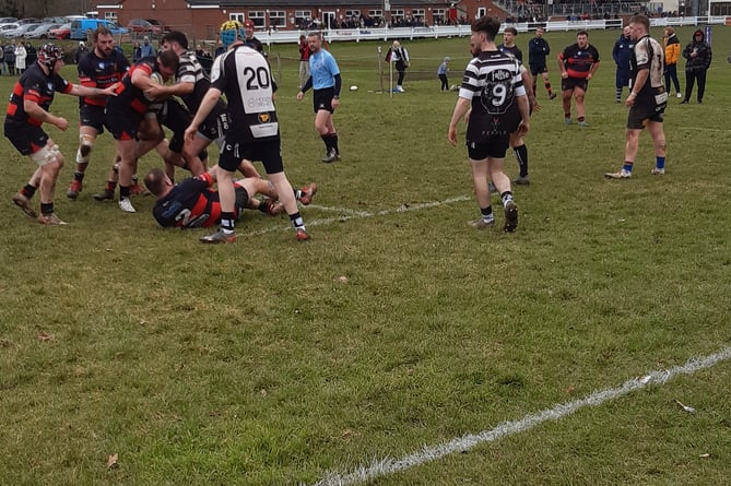 Jack Dyer powers towards the Wells try line.