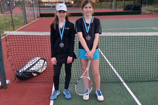 Wellington Tennis club tournament: U14 Girls singles winner, Connie (right)  and runner-up Keira (left). 
