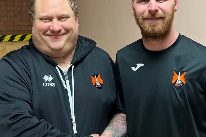 Man-of-the-match for Wellington Reserves was Luke Perry and he is pictured with the team’s kit man Adrian Ridgeway, who sponsored the match ball for the game.