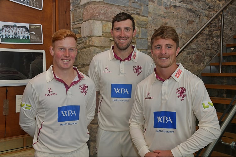 Somerset cricketers  James Rew , Craig Overton, and Skipper Tom Able display their new shirts for the  2023 County Season