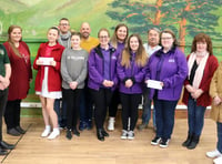 Charity fundraisers presented cheque from carnival committee 