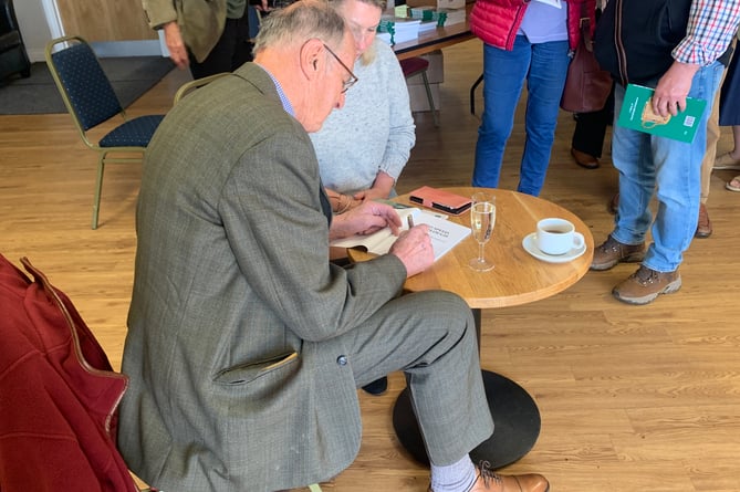 Wesley Wyatt signed copies of his book at a well attended Wiveliscombe book launch