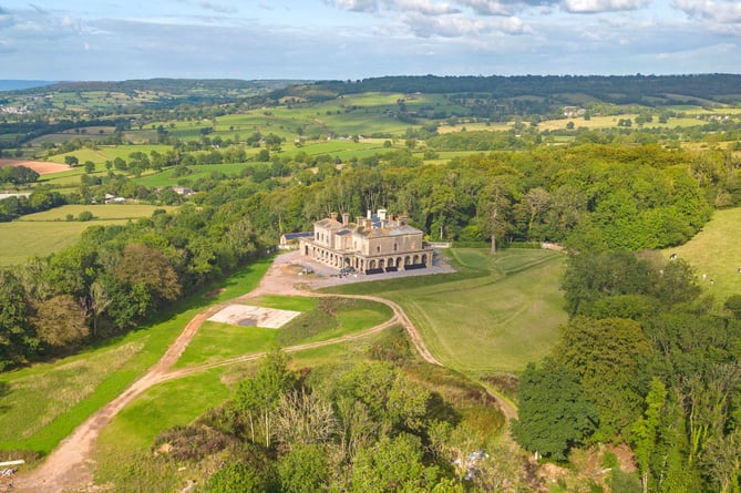 Blackborough House in the Blackdown Hills, on the Somerset-Devon border. See SWNS story SWLNderelict. The opportunity to restore a crumbling architectural gem in Devon is up for grabs for just under Â£1.5 million.Despite its grand faÃ§ade, the Grade II Listed country mansion was never completed and is currently derelict and in need of a complete renovation.Blackborough House has 14-bedrooms, 15 bathrooms and nine reception rooms, and was designed to be an Italianate palace.It is nestled in Blackdown Hills, which spreads along the border between Somerset and Devon and has been named an Area of Outstanding Natural Beauty.
