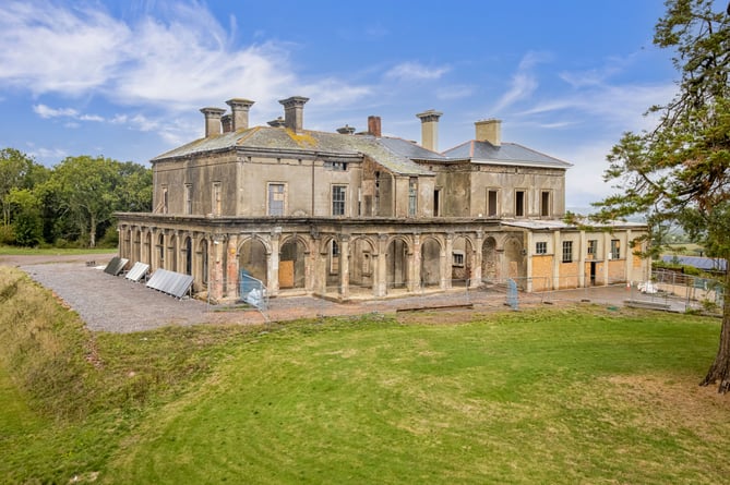 Blackborough House in the Blackdown Hills, on the Somerset-Devon border. See SWNS story SWLNderelict. The opportunity to restore a crumbling architectural gem in Devon is up for grabs for just under Â£1.5 million.Despite its grand faÃ§ade, the Grade II Listed country mansion was never completed and is currently derelict and in need of a complete renovation.Blackborough House has 14-bedrooms, 15 bathrooms and nine reception rooms, and was designed to be an Italianate palace.It is nestled in Blackdown Hills, which spreads along the border between Somerset and Devon and has been named an Area of Outstanding Natural Beauty.
