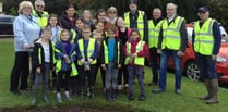 Pupils plant a purple welcome for spring