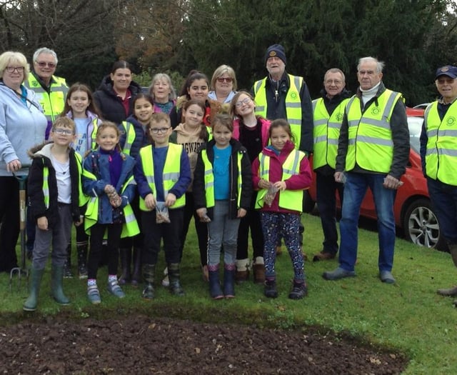 Pupils plant a purple welcome for spring