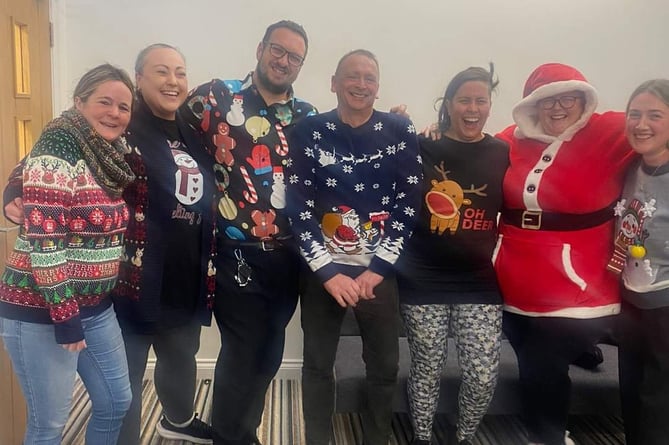 Staff from Bluebird Care Wellington who took part in a Christmas jumper charity day.