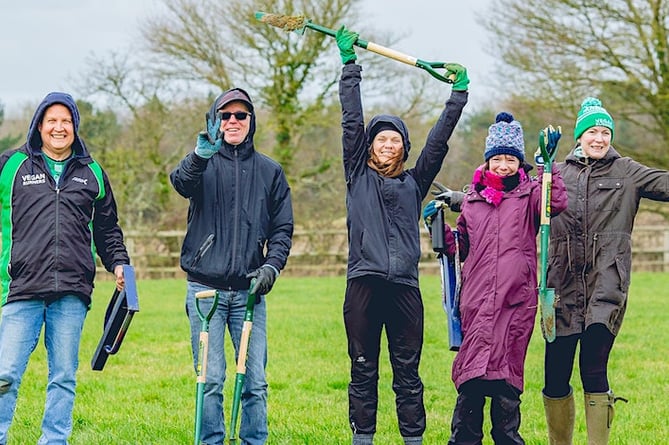 Volunteers on a Protect Earth tree planting project.