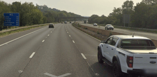 Woman charged after three injured in M5 smash