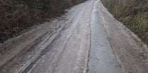 Crash on iced-up road with blocked drains