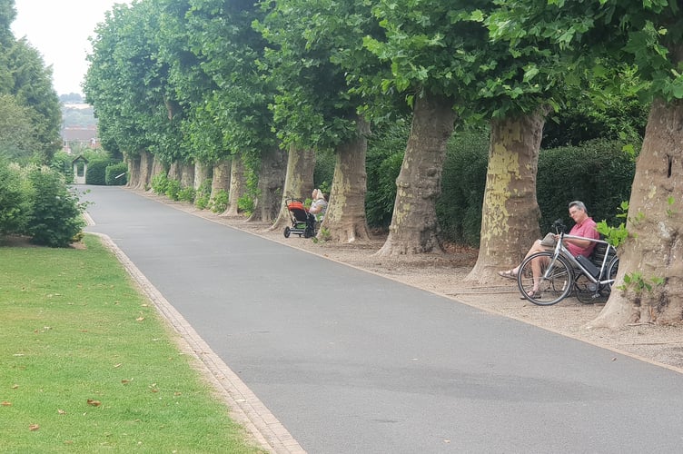 Residents relax in Wellington Park.