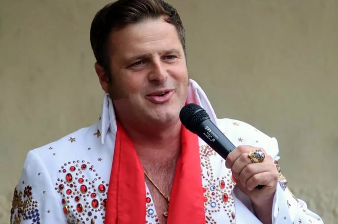 Stuart Horne performing as Elvis at one of the summer concerts in Wellington Park last year.