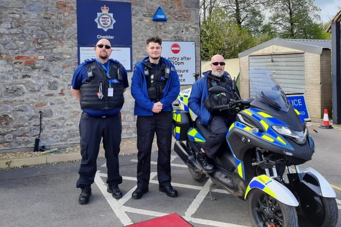 The Cheddar policing team with a hybrid motorbike