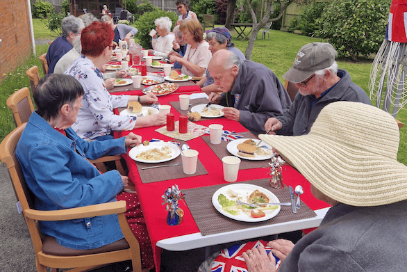 Old Vicarage, Wellington, residents enjoy an al fresco lunch to celebrate the 80th anniversary of D-Day.