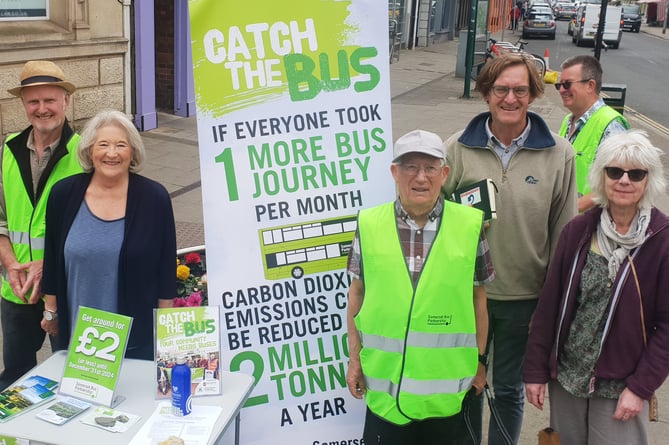Helping with the Wellington Bus User Group stall in the town centre were (left to right) Steve Gregory, Sue Stevens, from Wiveliscombe, John Ainsworth, town council climate change strategy officer Stephen Tate, Barrie Childs,  and Anne Elliott-Day.