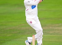 Somerset close gap on Surrey 
