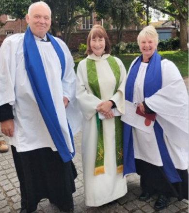 Hemyock Rector the Rev Canon Becky Totterdell (centre) with the benefice's newest licensed lay ministers Piers and Liz Langdon.