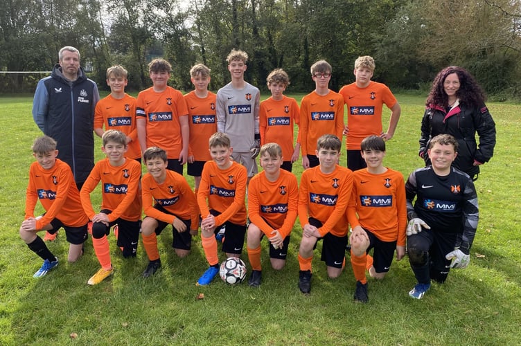 Pictured are Ricki and Amy Alderman from Hair by Alderman who have sponsored Wellington Towns U14 Match ball for the season. Back from left: Ricki Alderman, Zak Foster, Leo Mold-Dunn, Ollie Bradford, George Brookes, Sam Alderman, Quinn Warwick, Ethan Bellamy, Amy Alderman. Front from Left: Jayden Glynn, Reece Burke, Jack Fowler, Finn Hayward, Archie Winter, Jack Bates, Fletcher Langley, Harrison Howell.