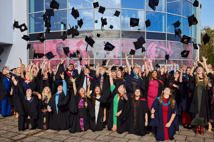 Students celebrate their graduation from University Centre Somerset. PHOTO: Moment Photography.