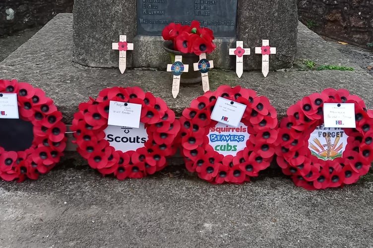 Poppy wreaths laid at the war memorial in Hemyock. PHOTO: Janice Bawler.