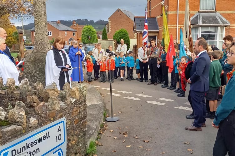 An act of Remembrance at Hemyock war memorial on Sunday. PHOTO: Janice Bawler.