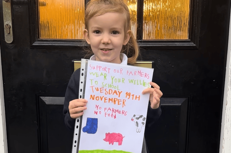 Isla Martin aged 5 showing support for British farmers and her farmer Grandad Daniel Pile, wearing her wellies to St Andrews Church School, Taunton. 