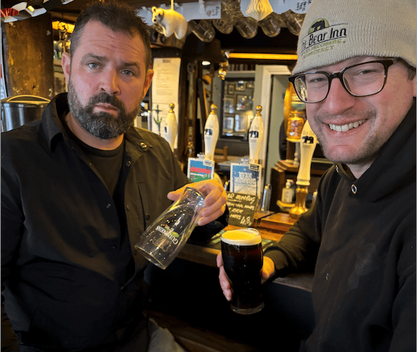 Publican Jon Coward and brewer Tom Davis in The Bear Inn, Wiveliscombe, preparing to overcome a shortage of Guinness by brewing heir own.