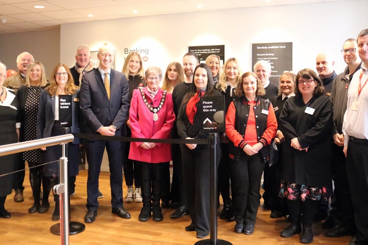 Gideon Amos joins Wellington's Mayor, Cllr Janet Lloyd in welcoming the new Banking Hub to the town