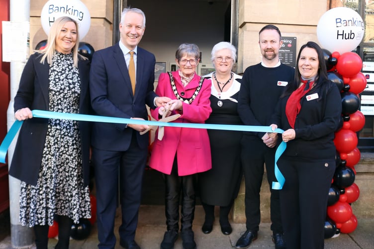 Gideon Amos joins Wellington's Mayor, Cllr Janet Lloyd in welcoming the new Banking Hub to the town