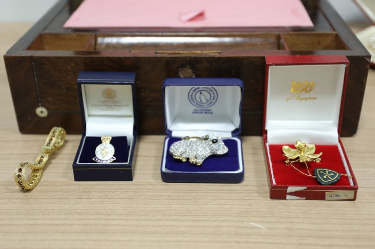 Police have added more items, including a picture, jewellery, coins, china and collectables, to an online gallery of suspected stolen property.
