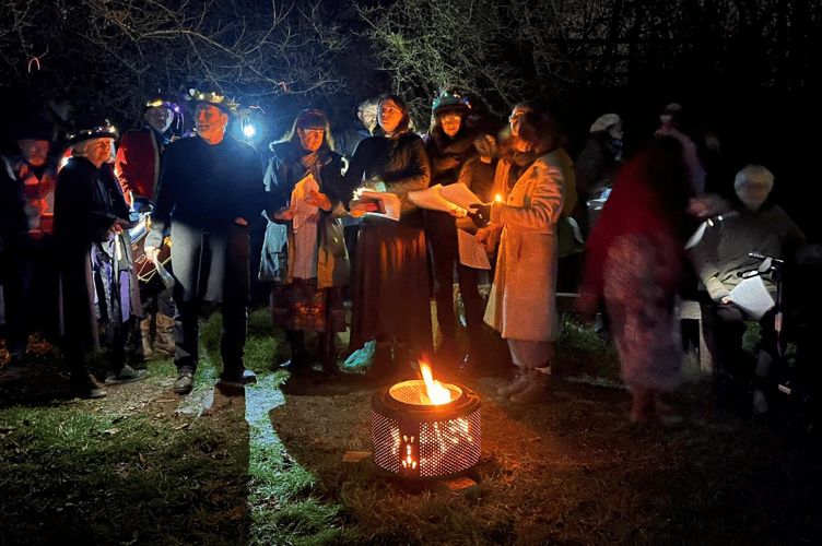 Revellers gather at the Swain's Lane community orchard to celebrate the annual Wassail organised by the Wellington Folk & Custom Society