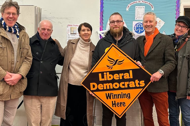 Liam Pollard is pictured, third from right, with Gideon Amos and other supporters.