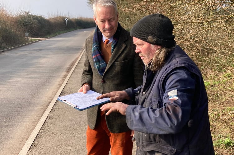 Gideon Amos talks to Creech St Michael resident Shaun Gladwin-Wells in Hyde Lane