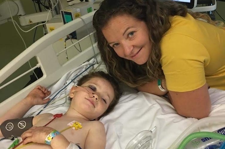 Betty Boland, whose life was saved by the Dorset and Somerset Air Ambulance, and her mum Sarah in hospital. PHOTO: DSAA.